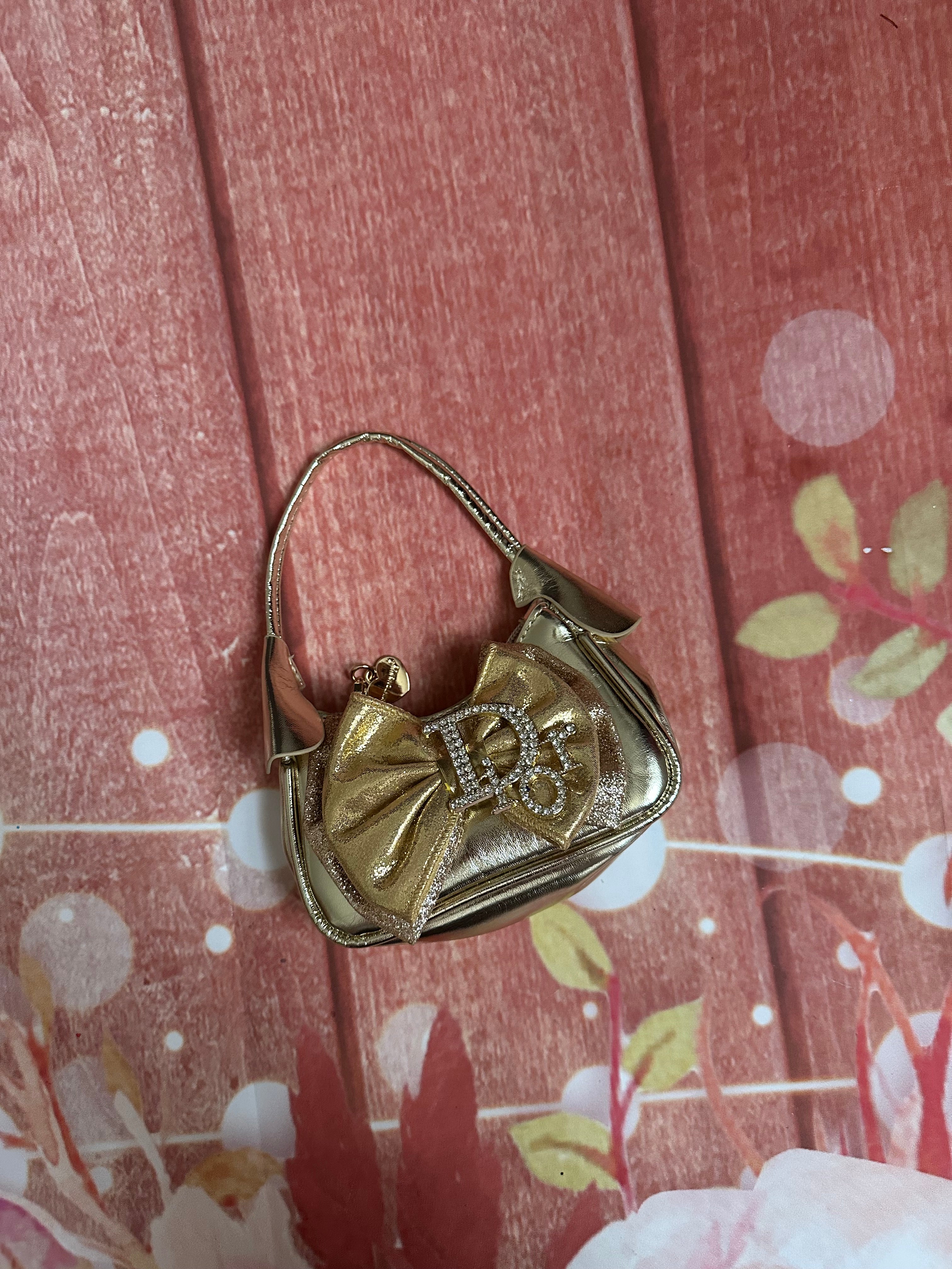 Gold Dior purse