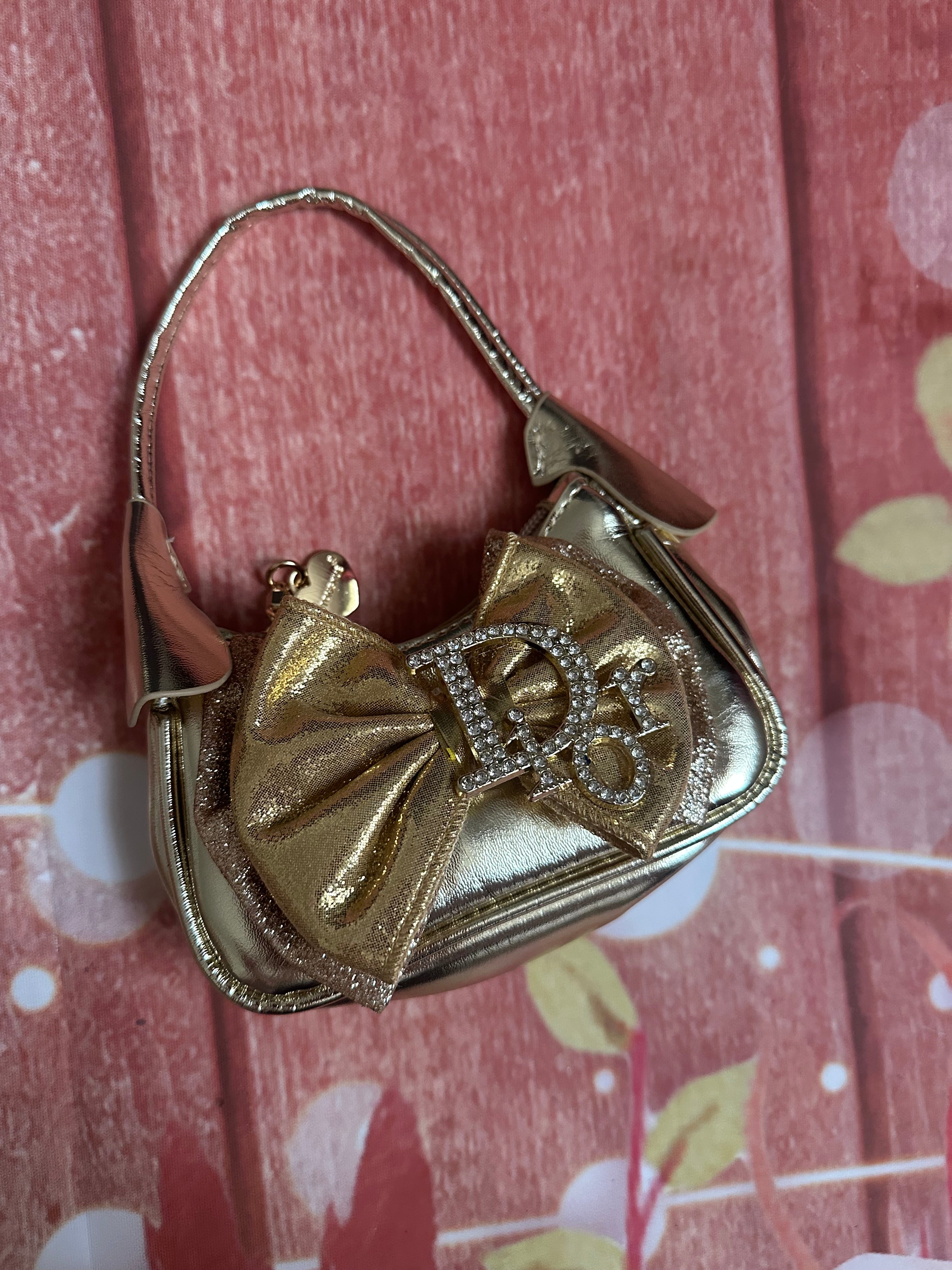 Gold Dior purse