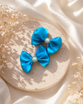 Turquoise piggy bow