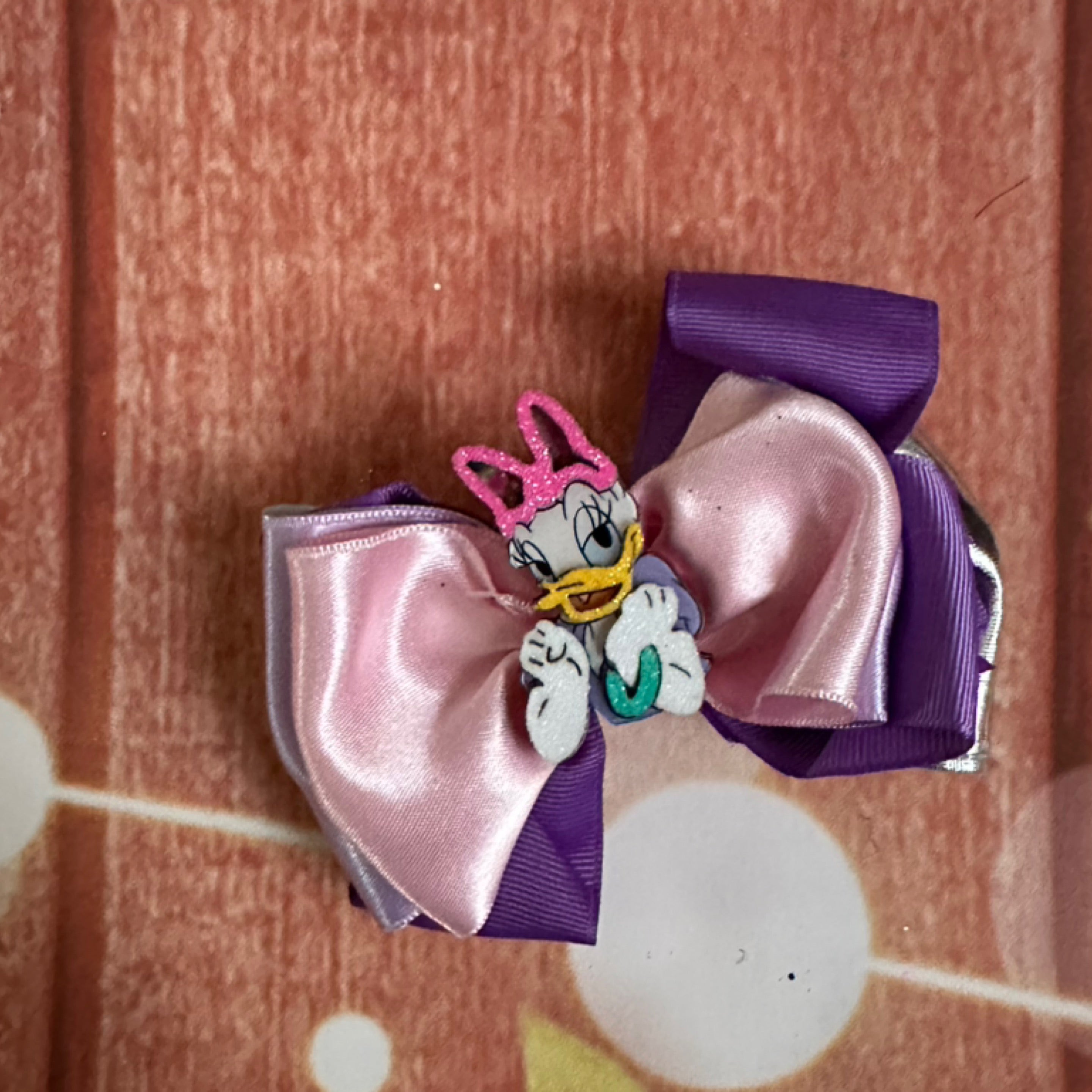 Daisy piggy clip
