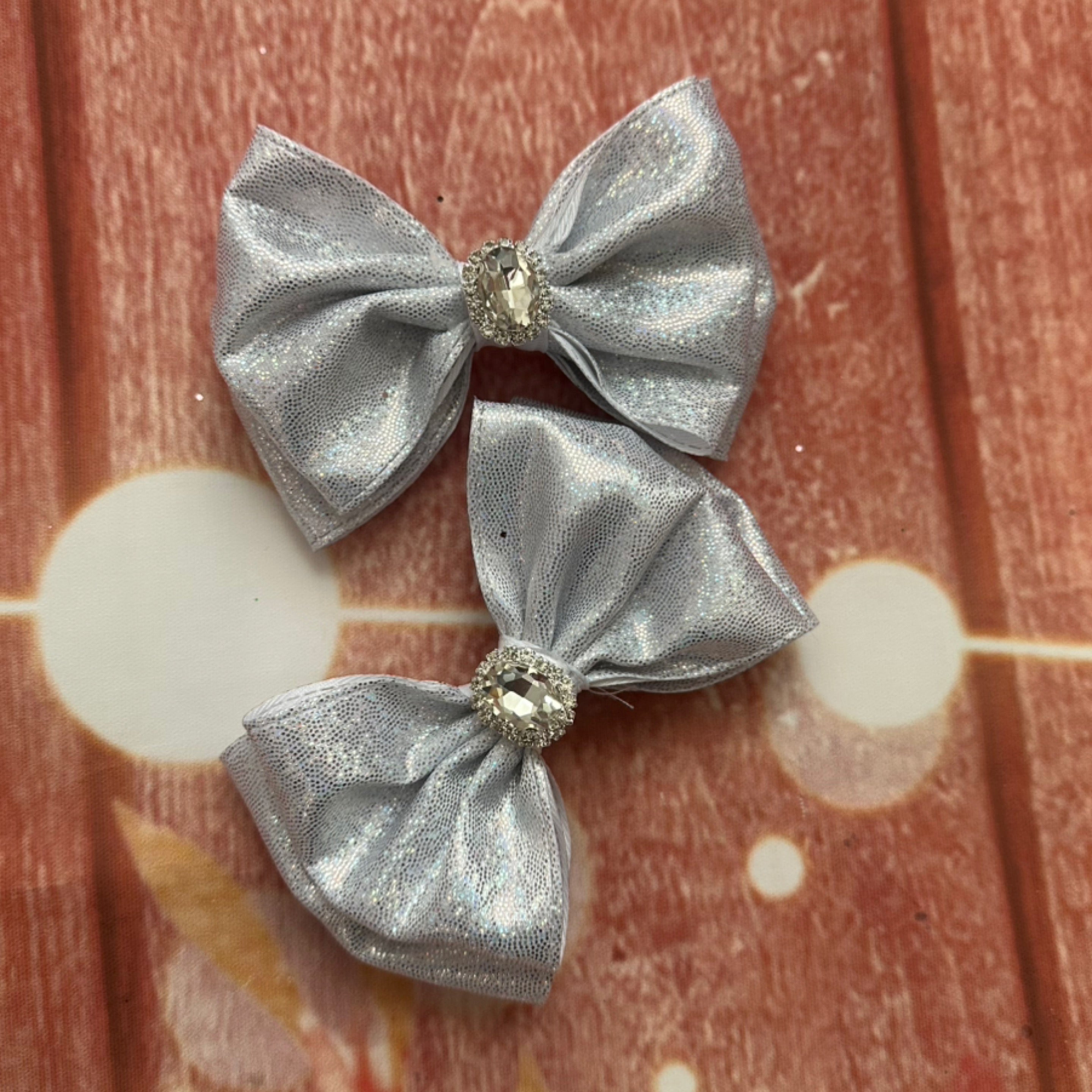 Holographic silver piggy clip