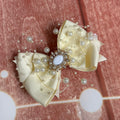 Piggy size off white pearl clip