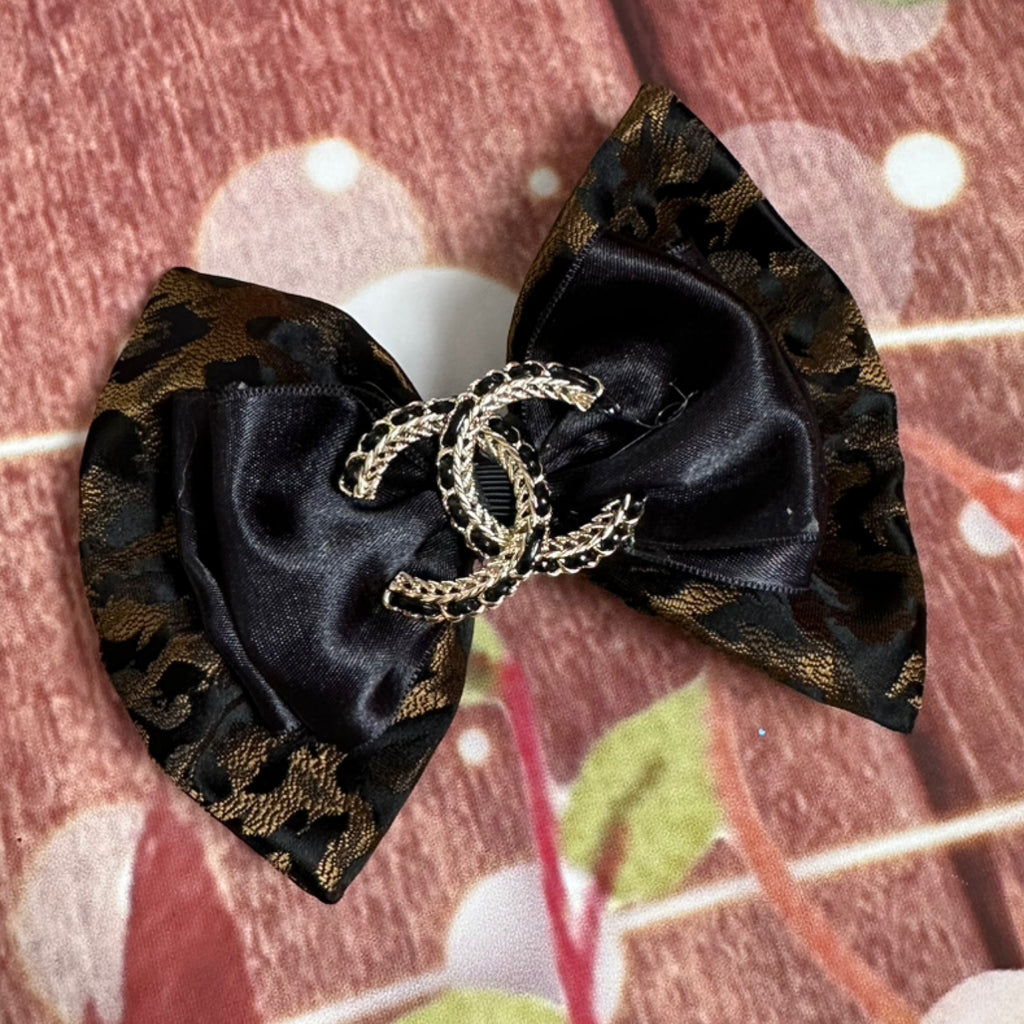 Leopard head bow