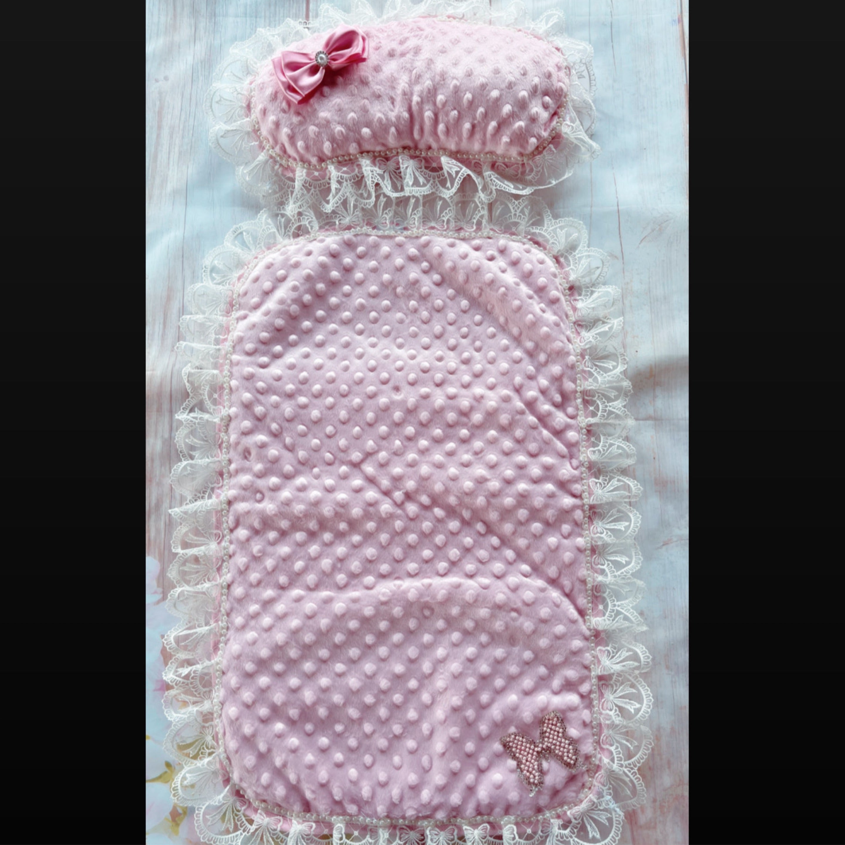 Pink laying pad and matching pillow