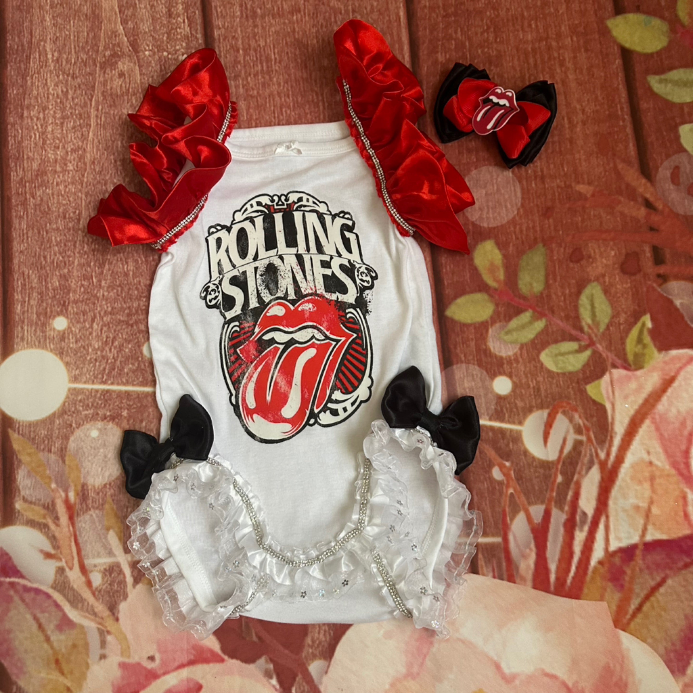 Rolling Stones onesie and bow