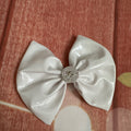White patent leather clip
