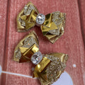 Gold holiday shimmer bows