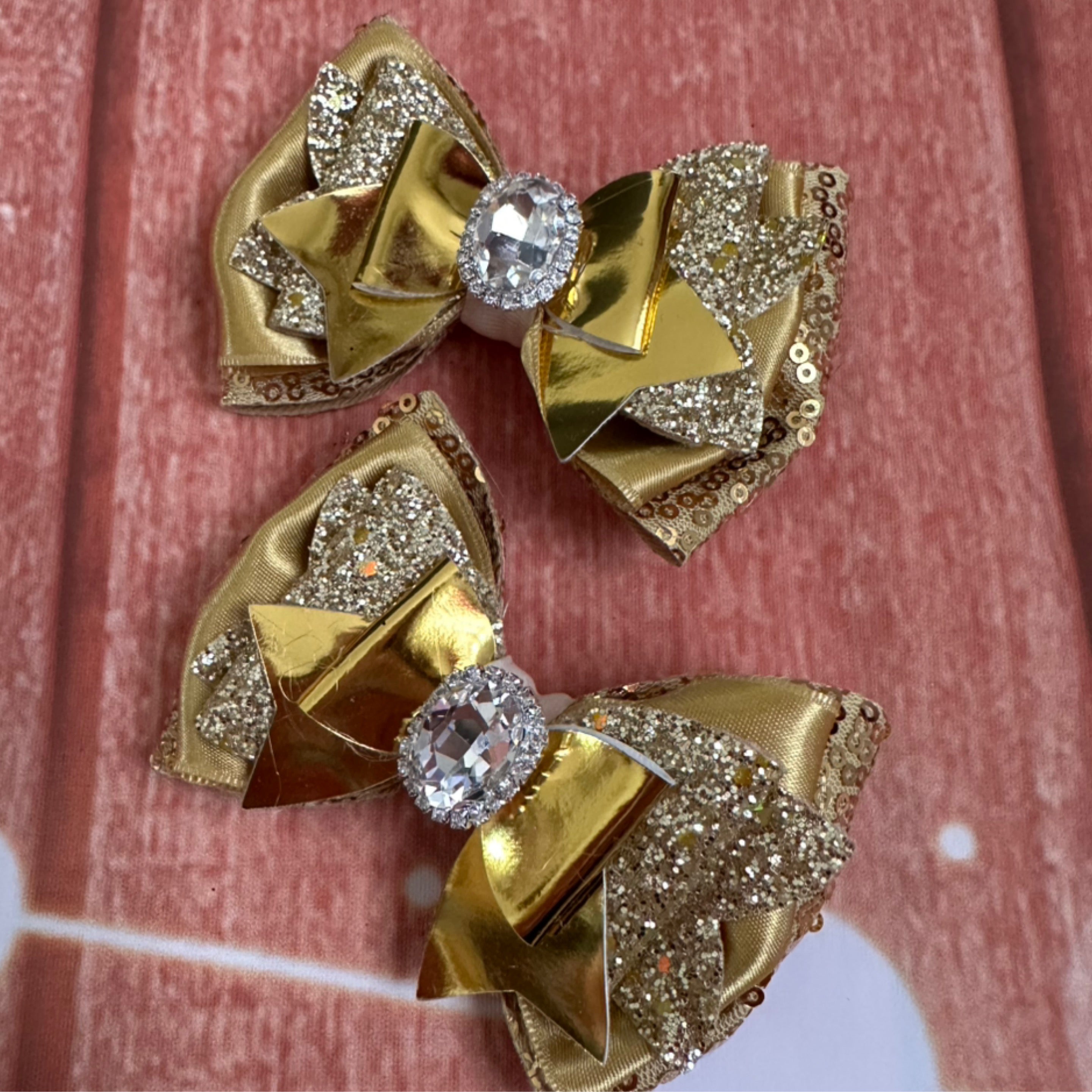 Gold holiday shimmer bows