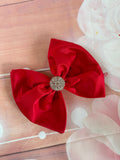 Solid red bow