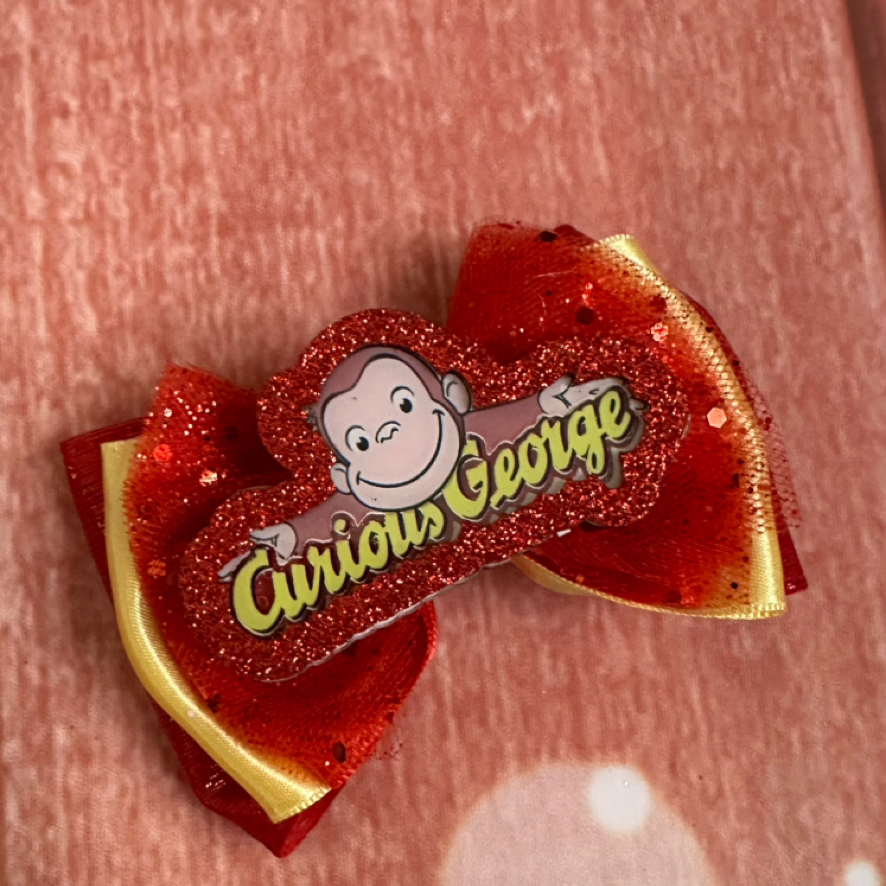 Curious George piggy bow