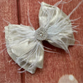 Liquid satin feather 6 inch bow