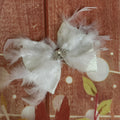 White turkey feather hair bow