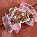 Pink gingerbread hair bow